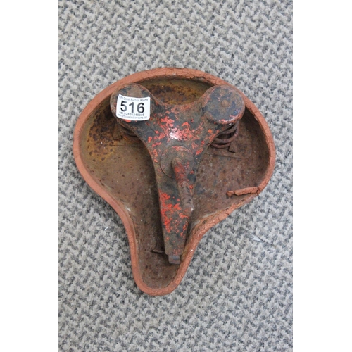 516 - A vintage Tri-ang saddle.