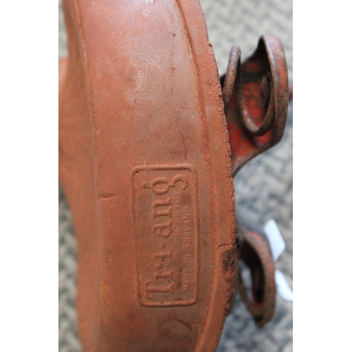 516 - A vintage Tri-ang saddle.