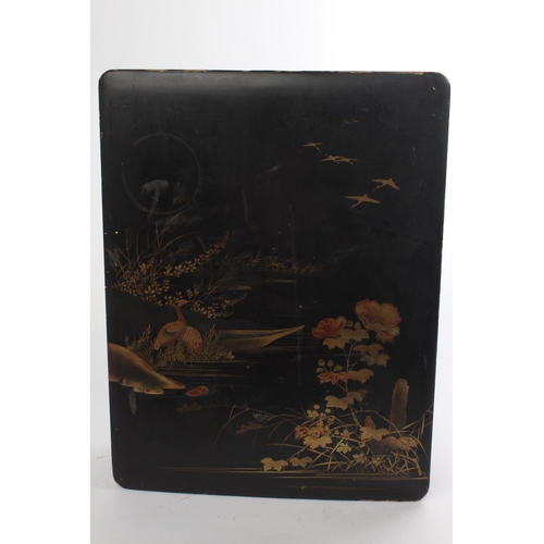 535 - An antique lacquered storage box with oriental hand painted design.