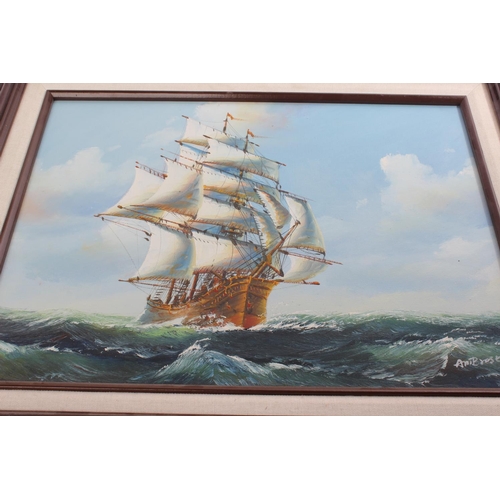 599 - A framed print of a sailing ship, signed.