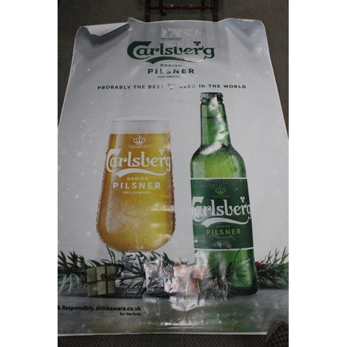 614 - A large poster/ banner from Carlsberg beer.