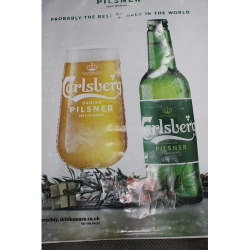 614 - A large poster/ banner from Carlsberg beer.