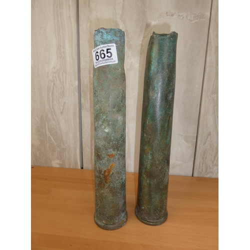 665 - Two artillery shells. Measuring 12inches tall.