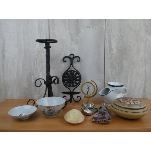 678 - An assortment of items to include candlesticks, a shaving mug and more.