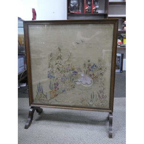 684 - An antique tapestry fire screen.