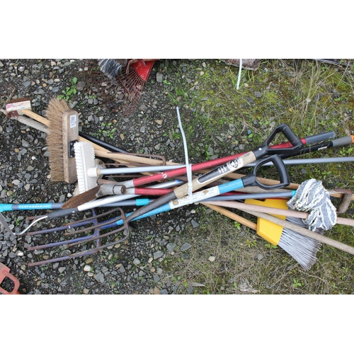 10 - An assortment of various garden tools.