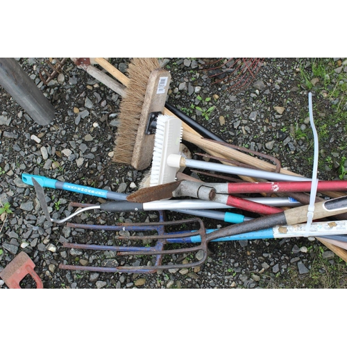 10 - An assortment of various garden tools.