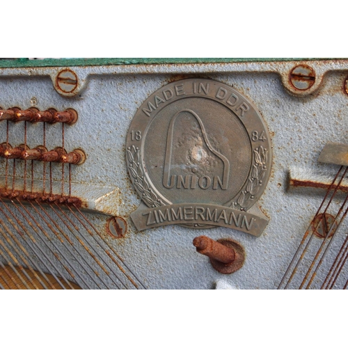 105 - An antique Zimmermann Union piano harp/ frame.