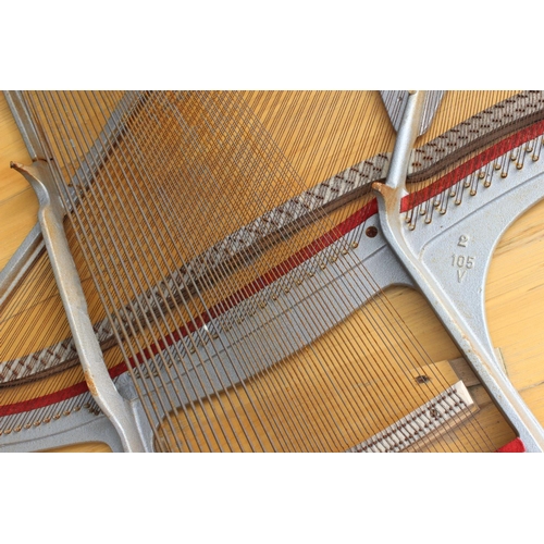 105 - An antique Zimmermann Union piano harp/ frame.