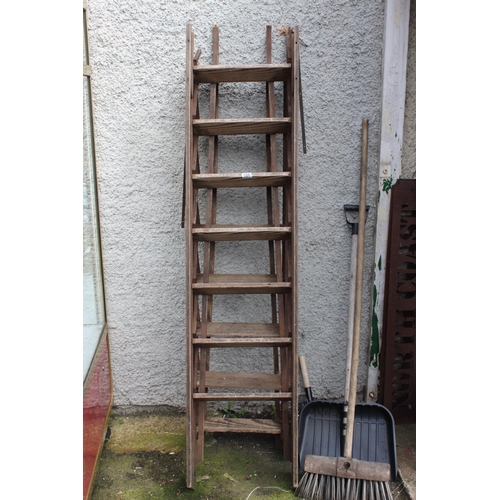 106 - Two wooden ladders.