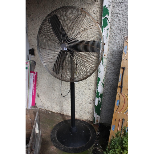 108 - A large floor standing fan. (untested)