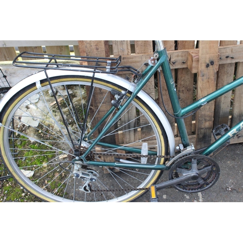 109 - A vintage style Raleigh ladies bicycle with basket.