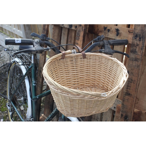 109 - A vintage style Raleigh ladies bicycle with basket.