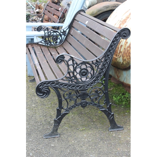 2 - A garden bench with cast iron ends.