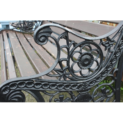 2 - A garden bench with cast iron ends.