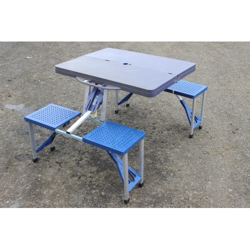 22 - A folding camping bench set.