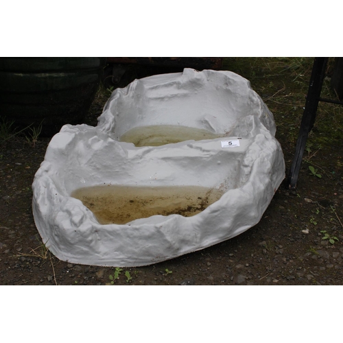 5 - A plastic garden pond liner.