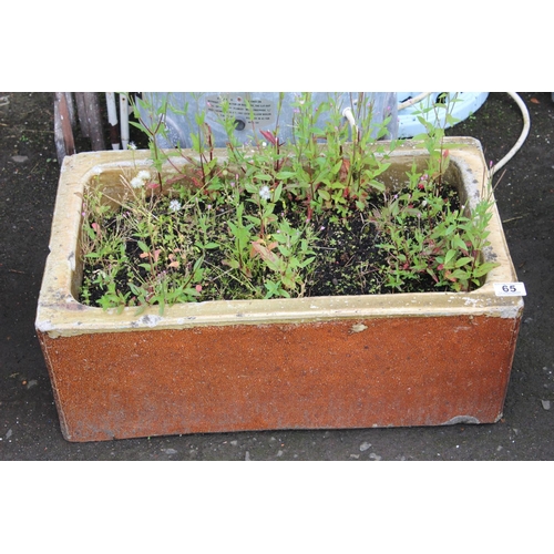 65 - An antique 'Garnkirk' Belfast style clay sink, measuring 38cm x 60cm.