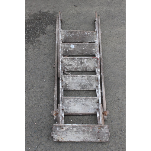 71 - A wooden step ladder.