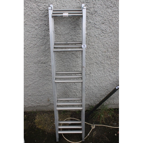 73 - A metal step ladder.