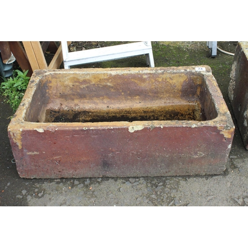 74 - An antique Belfast style clay sink, measuring 70cm x 39cm.