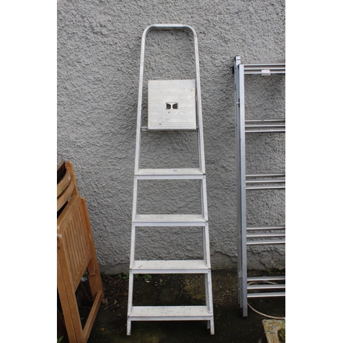 75 - A folding step ladder.