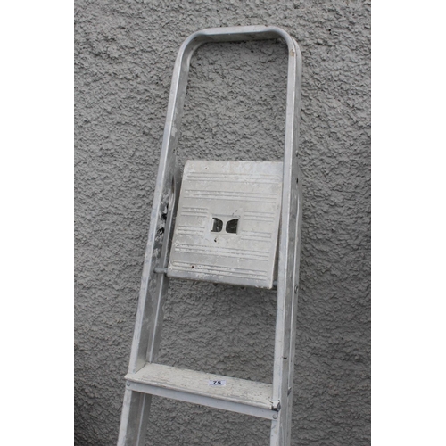 75 - A folding step ladder.