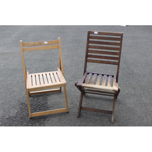 76 - Two folding wooden garden chairs.