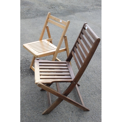 76 - Two folding wooden garden chairs.