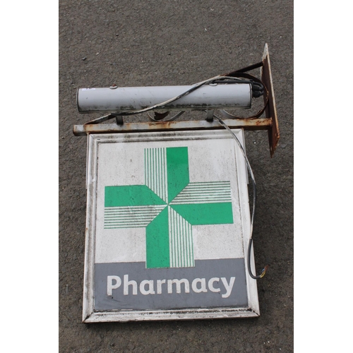 78 - A wall mounted 'Pharmacy' shop sign.