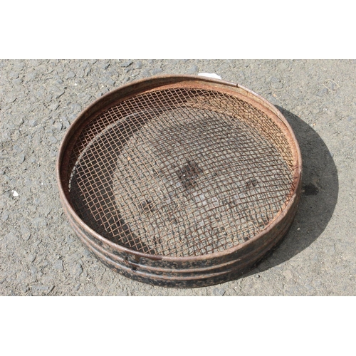 83 - An antique garden sieve.