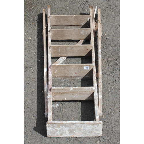 85 - A wooden step ladder.