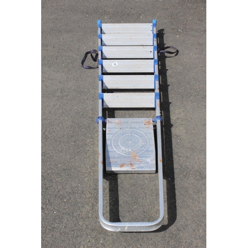 90 - A large metal stepladder.