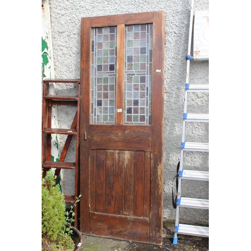 94 - An antique door with stained glass panels, salvaged from the Atlantic Bar/ Londonderry Hotel Portrus... 