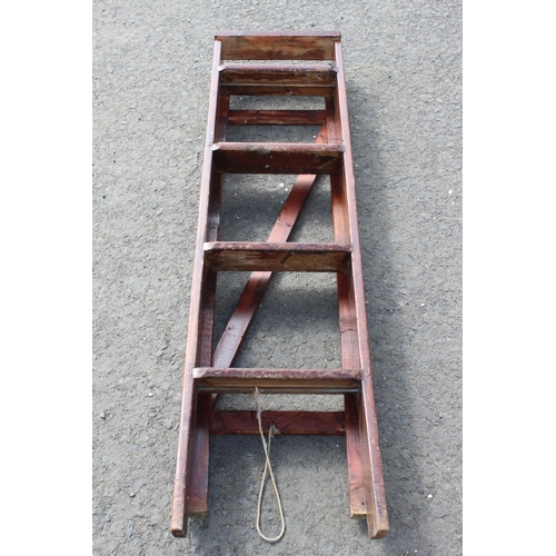 95 - A wooden stepladder.