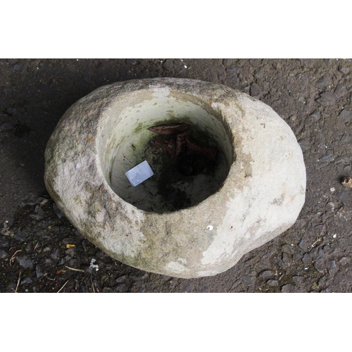 97 - An antique stone planter.