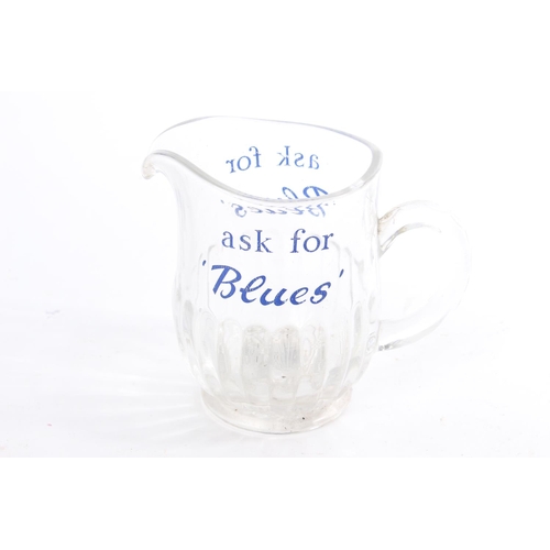 125 - A vintage 'Ask for Blues' glass jug.