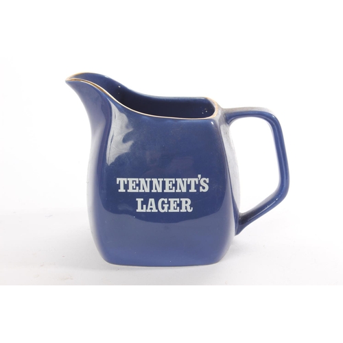 126 - A vintage Wade Tennett's Lager ceramic jug.