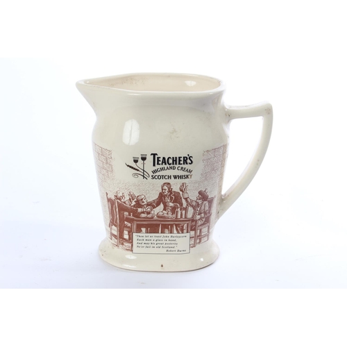 128 - An antique Seaton Pottery Teacher's Highland Cream Scotch Whisky pub jug.