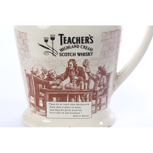 128 - An antique Seaton Pottery Teacher's Highland Cream Scotch Whisky pub jug.