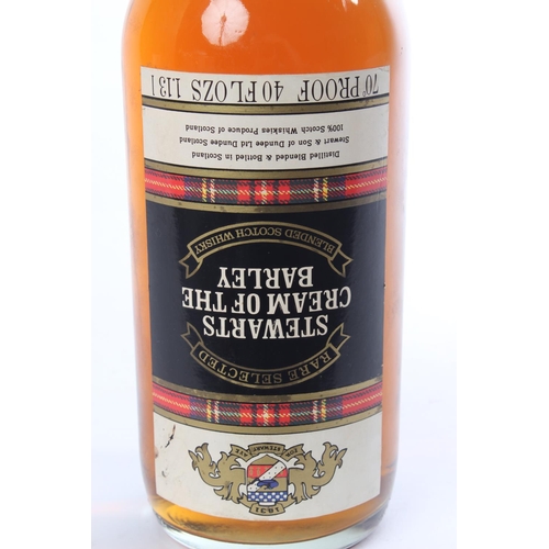 130 - A bottle of 1.13L Stewarts Cream of the Barley scotch whisky.