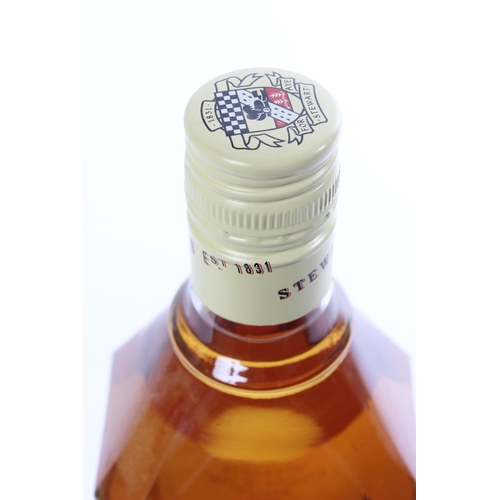 132 - A bottle of 70cl Stewarts Cream of the Barley scotch whisky.