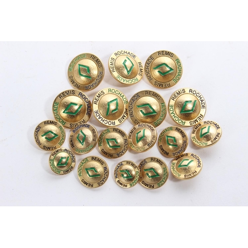 146 - A lot of vintage gold coloured metal and enamel Rochade Remis Designer buttons.