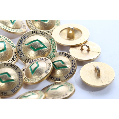 146 - A lot of vintage gold coloured metal and enamel Rochade Remis Designer buttons.