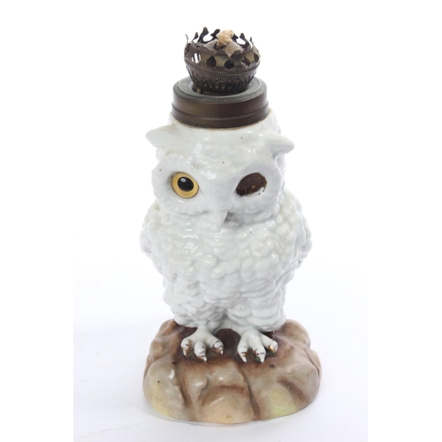 155 - An antique oil lamp base in the form of a White Owl by German maker Sitzendorf (a/f).