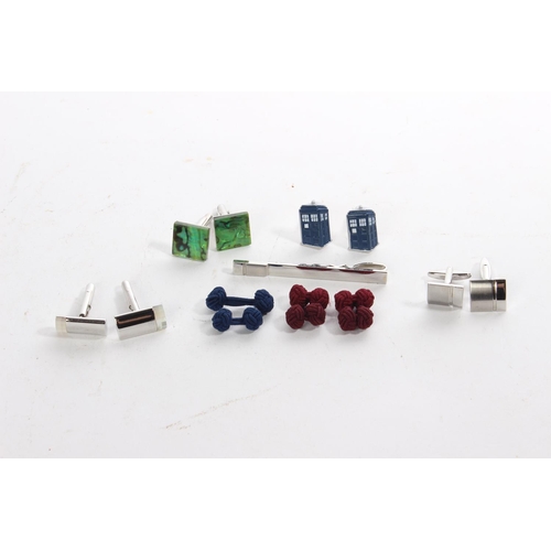 160 - A collection of cufflinks and a tie pin.