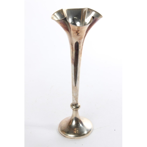 165 - A Sterling silver trumpet vase, measuring 21cm tall.