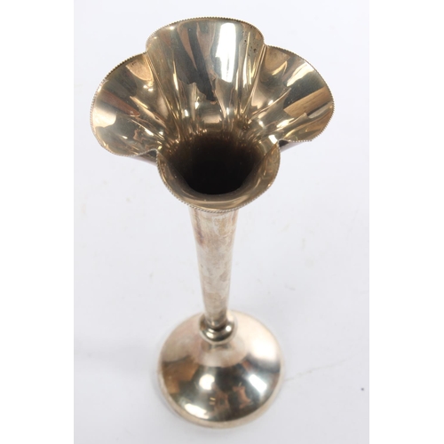 165 - A Sterling silver trumpet vase, measuring 21cm tall.