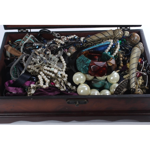 172 - A jewellery chest and contents.