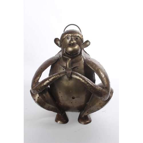 183 - A metal lantern modelled as a monkey.